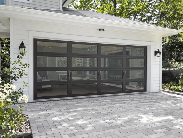 Heath Garage Door Repair design specialist presenting custom garage door options to Heath homeowner