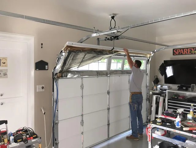 Garage door section replacement by Heath Garage Door Repair in Heath