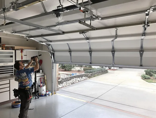 Garage door track repair service by Heath Garage Door Repair in Heath